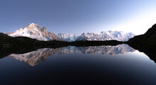 Snowy Peaks Of Mont Blanc Massif Mirrored In The Clear Water Of Lacs De Cheserys At Dusk, Chamonix, Haute Savoie, French Alps, France