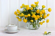 © MaskaRad - bouquet of yellow flowers in a glass jar