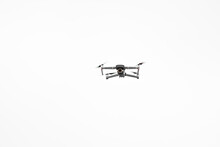 Quadcopter Camera Drone In Flight Isolated