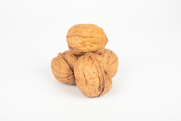 Wall Mural - This is a photo of walnuts with a white background.
