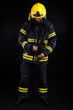 © blanke1973 - Firefighter in full firefighting gear on a black background