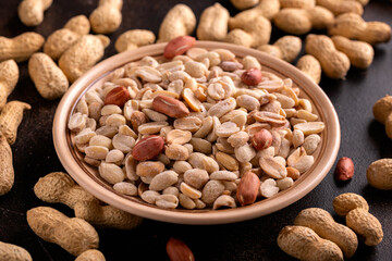 Wall Mural - Peanuts or monkey nuts in a plate