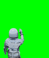 Wall Mural - Astronaut isolated on green background perfect for photo compositing
