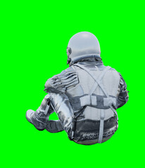 Wall Mural - Astronaut isolated on green background perfect for photo compositing