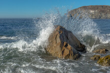 Wave Breaking On The Rocks