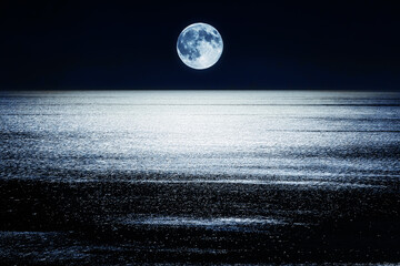 Wall Mural - full moon setting over the mediterranean sea