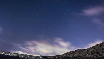 Wall Mural - clouds and stars over valley