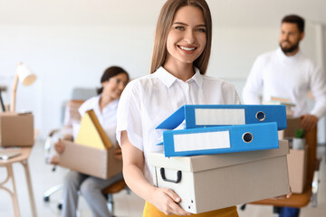 Poster - Young woman holding box with folders in office on moving day