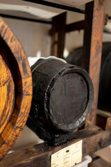 Wall Mural - Traditional production and aging in wooden barrels of Italian Balsamic grapes vinegar dressing in Modena, Italy