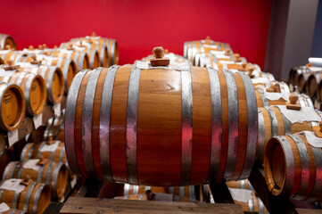 Traditional production and aging in wooden barrels of Italian Balsamic grapes vinegar dressing in Modena, Italy