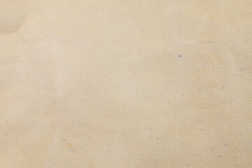 Sticker - Beige real leather background.