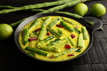 Moringa Oleifera, Muringa Raw Green Mango Curry. Kerala Vegetarian Recipes.