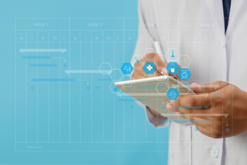 Wall Mural - healthcare and medical doctor smart tablet device  doctor analyzing medical report at the hospital background.