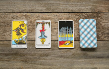 Tarot Cards On Wooden Table, Flat Lay