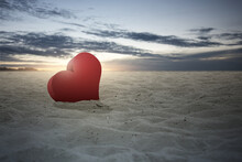 Heart On The Sand With A Dramatic Sky Background