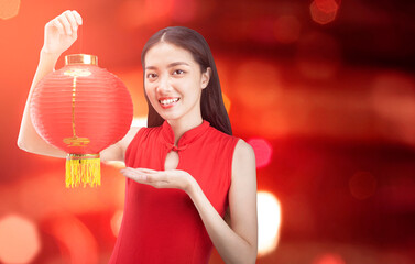 Poster - Asian Chinese woman in a cheongsam dress holding Chinese lantern