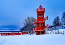 Red Lighthouse In The Snow