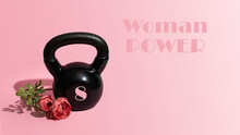 Black Kettlebell With Peon Flower On Pink Background For  Woman Power Concept.