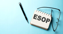 ESOP Text Written On A Notepad On The Blue Background