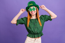 Photo Of Shiny Charming Young Lady Wear Green Blouse Cap Celebrating St Patrick Day Smiling Isolated Purple Color Background