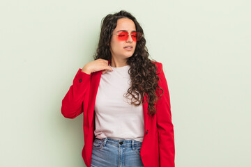 Wall Mural - young pretty hispanic woman feeling stressed, anxious, tired and frustrated. cool businesswoman