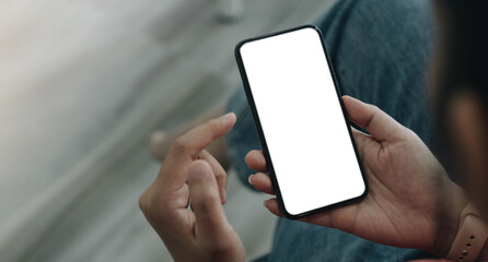 woman using Smartphone. Blank screen mobile phone for graphic display montage.networking service..