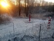 Poland Belarus border fence during winter