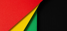 Black History Month Color Background. African American History Month Celebration. Abstract Red, Yellow, Green Color Flag On Black Paper Background