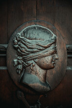 Bas-relief Of Themis On The Wooden Door Of The Court