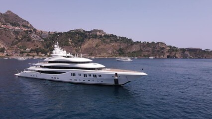 Wall Mural - A huge motor yacht at the anchor.