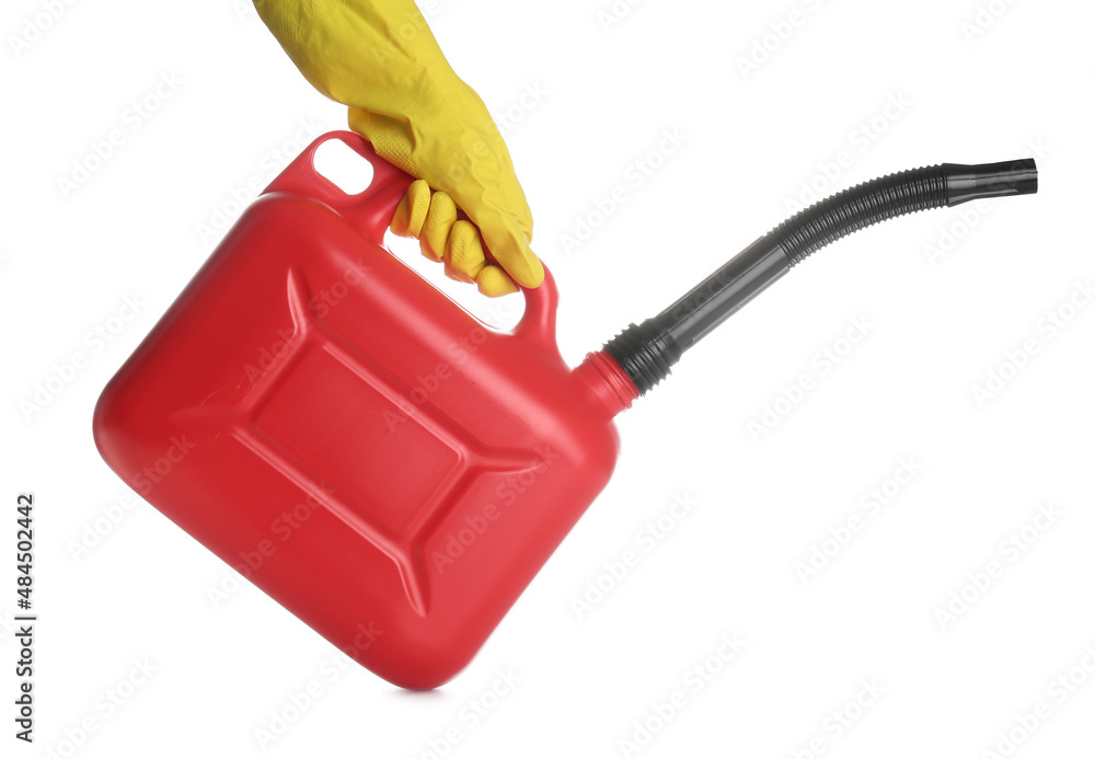 Female hand in rubber gloves holding canister on white background