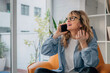 © carballo - woman at home talking on mobile or cell phone