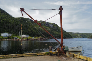 Sticker - A view of a winch on a dock used for fishing