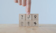 5W1H concept. Business framework and analysis. WHO WHAT WHERE WHEN WHY HOW Questions. The wooden cubes with 5W1H symbols and hand holds 