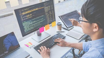 Wall Mural - programmer working in a software development and coding technologies. website design. technology con