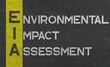 Environmental impact assessment (EIA), EIA acronym written over road marking yellow paint line. environmental acronyms and abbreviations.
