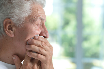 Sticker - portrait of sad senior man