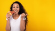 © Prostock-studio - Portrait Of Happy Lady Eating Pizza And Pointing Away