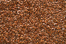 Linseed Or Flaxseed Background, Brown Flax Seeds. Flat Lay, Copy Space