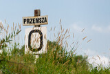 Fototapeta  - Znak informujący o dopływie Wisły, rzeka Przemsza. Polska lato.