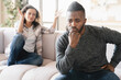 African wife and husband arguing crying misunderstanding between partners.Marriage problems, abuse, cheating. Spouses couple divorce. Psychology therapy. Scandal
