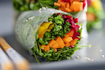 Canvas Print - Rice paper roll with vegetables on plate