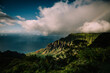 © Cavan Images - Sun Peeks in over the Kalalau Valley in Kauai's Nā Pali Coast