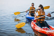 © Petro - Couple together kayaking on the river