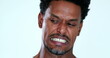 Person feeling disgust emotion portrait face close-up. African black man disliking