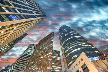 Street upward view of Downtown San Francisco skyscrapers at sunset, California - USA.