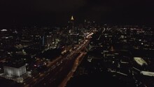 Aerial Wrap Around Shot Of Downtown Atlanta At Night