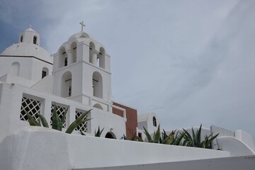 Wall Mural - View of an orthodox Greek chapel in Fira Santorini Greece