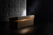 box with gold light against the background of decorative bricks
