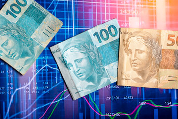 Wall Mural - Brazilian money over a chart